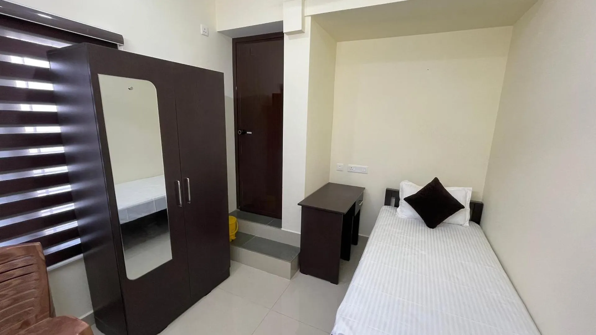 Uppercrest Residency Pala Hotel
